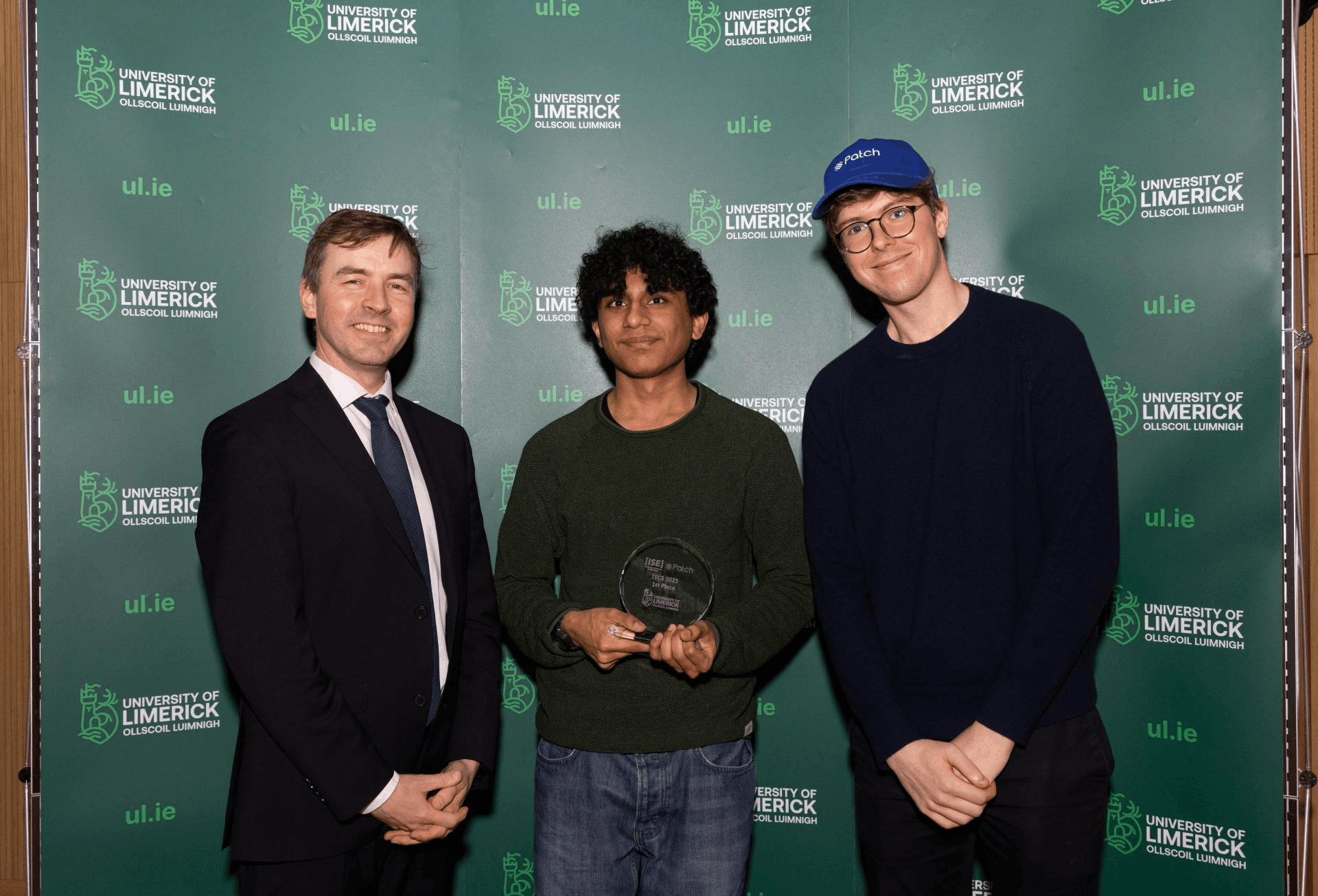 Arjun holding the TECS award at University of Limerick